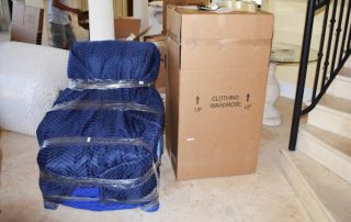 wrapped chair and box ready for move