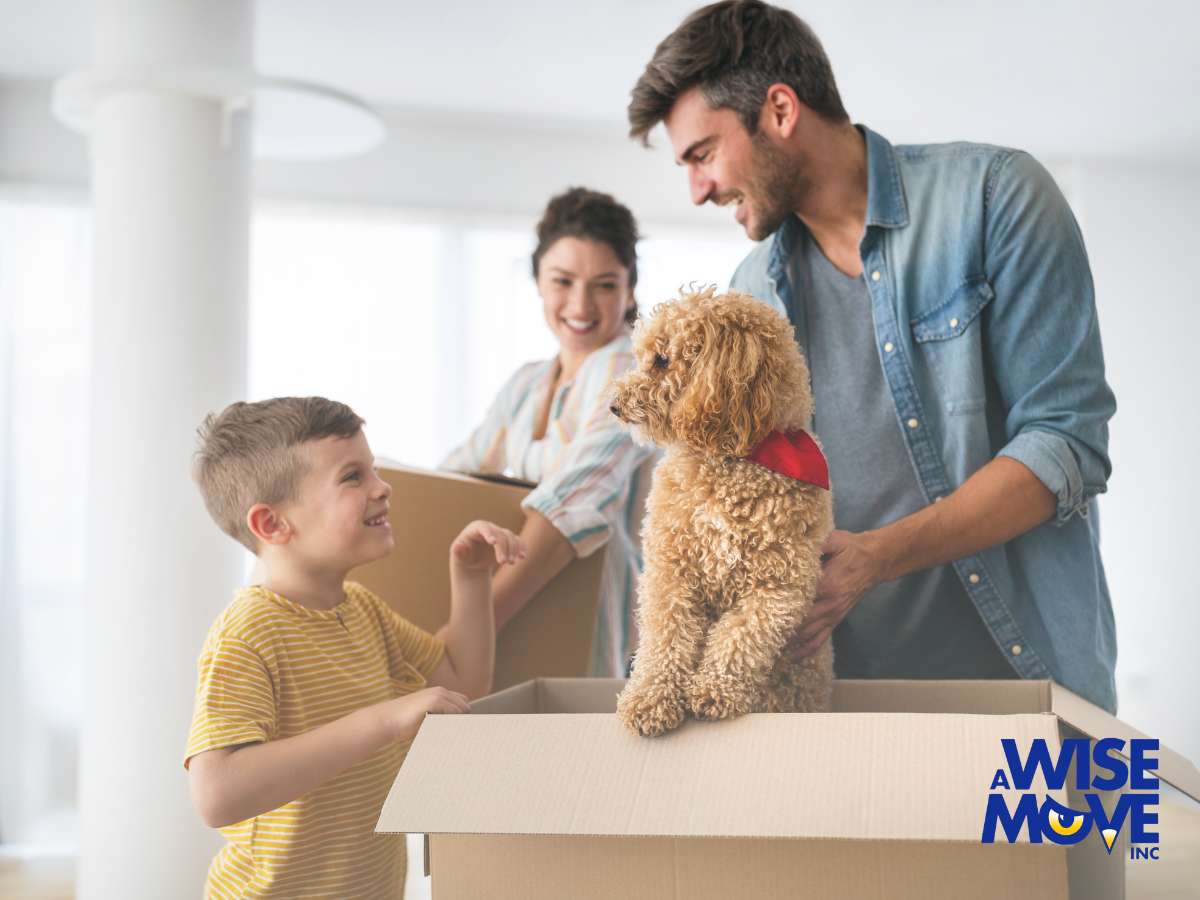 Family enjoying Moving Day with Pets, featuring a dog in a moving box