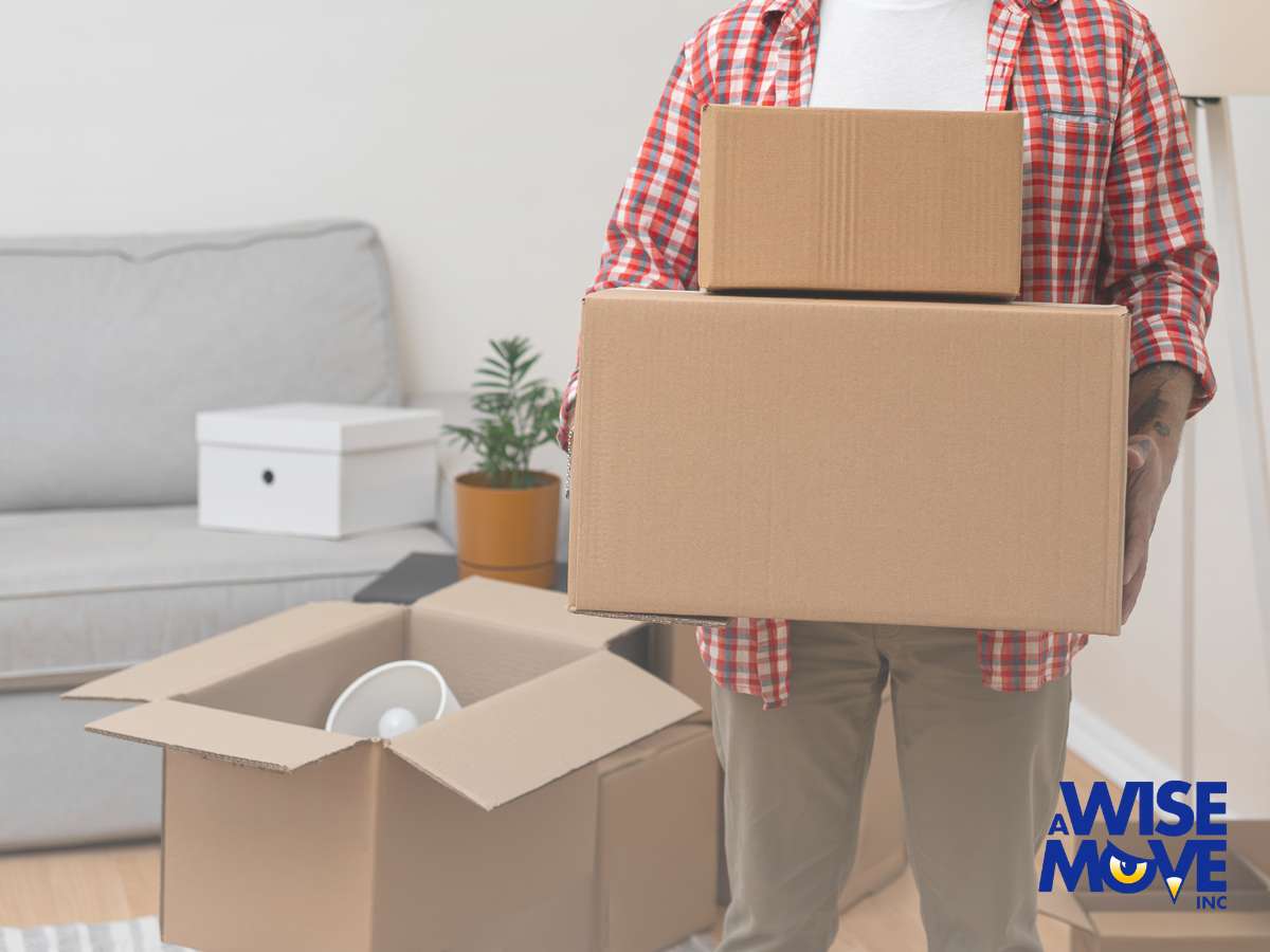 Person carrying boxes during a Residential Move to a new home